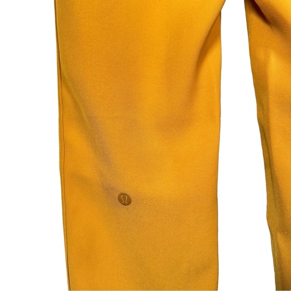 LULULEMON On the Fly 7/8 Woven Pant 27” in Fools Gold - Picture 8 of 13